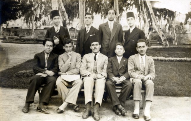 The Hajji brothers standing from left to right: Said, Abdelmajid and foremost on the right, Abdelkrim along with a number of their fellow students and one of their professors. Damascus, 1932.