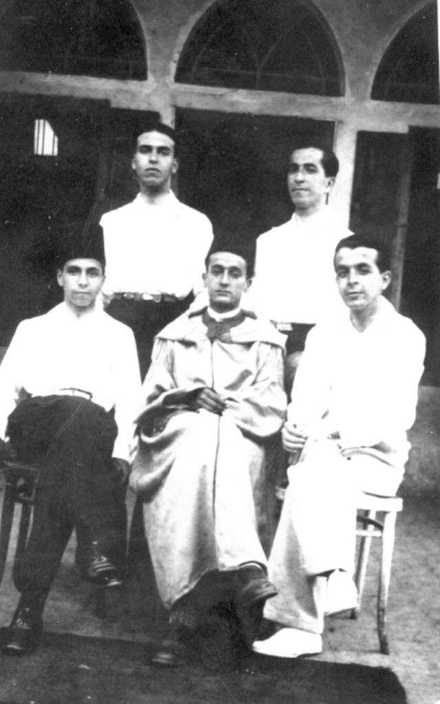 From left to right, Seated: Said Hajji, Mohammed El Khayat, Palestinian from the town of Acca, Abdelkrim Hajji. Standing: Abdelhadi Zniber, Abdelmajid Hajji. Beirut, 1931.