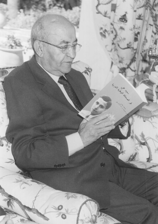 Abderrahman Youssoufi. Moroccan Prime Minister and General Secretary of the Union Socialistes des Forces Populaires Party. (Socialist Union of Popular Forces Party) perusing the Arabic version of the text dedicated to the memory of Said Hajji. Photograph was taken at the Prime Minister's residence on March 13, 2003.